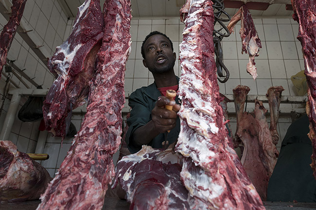 A butcher boning meat at the Gidir Magala meat market in Harar, Ethiopia.
This is where Abbas goes every morning to buy fresh meat for the hyenas.