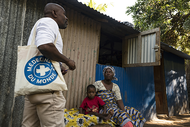 In the many slums of the island, NGOs such as Médecins du Monde help the people in the most difficult situations with administrative procedures and other matters. Here, Farid, a multi-handicapped boy, and his mother, both in an irregular situation, are advised about the appropriate organisations for their care. Mayotte - 2021