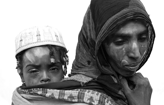 The pilgrims, too poor to make the Hajj pilgrimage to Mecca, converge to the mausoleum of Sheikh Hussein.