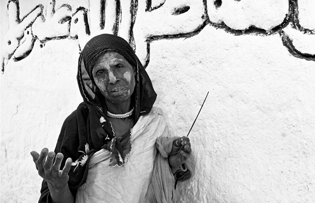 Pilgrims stay in front of the mausoleum for hours, crying and praying Sheikh Hussein to receive a good harvest, a land to farm, a birth of a child or healing.