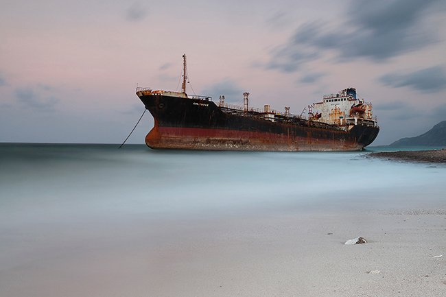 With its strong gusts or its light breeze, the wind sculpts the landscapes of the island and dictates its law to the 60,000 inhabitants. Here, the Gulf Dove, an Omani oil tanker, was washed away on the Deleisha bay during a storm in November 2019. Since that day he has been there. Knowing that it will remain here for a long time, the locals use to say: <i>It is ours now</i>.  Socotra - Yemen - 2020