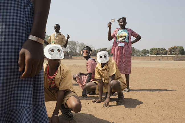 Students from Alpha Yaya School in Faranah during a role-playing game organized by the Chimpanzee Conservation Center to raise awareness about the protection of chimpanzees and their habitat.